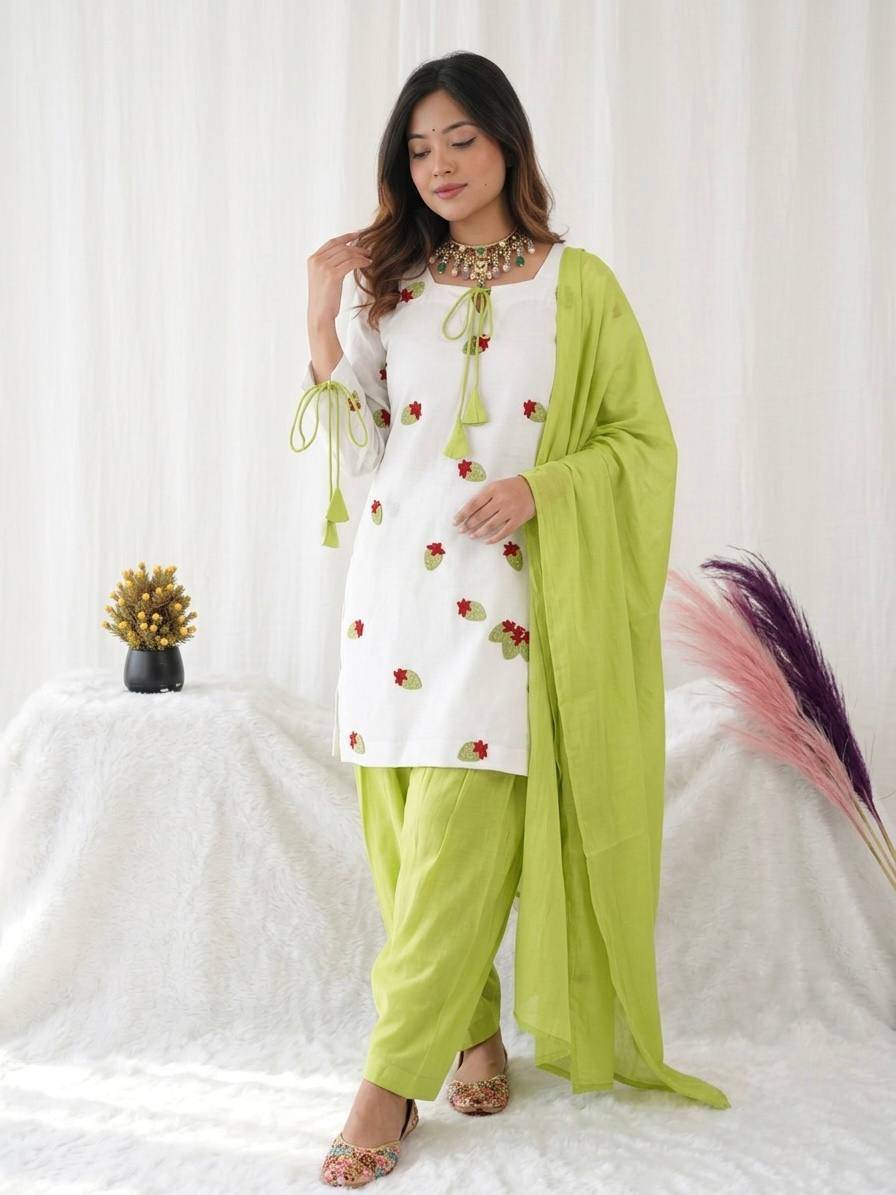 Ethereal Ivory White Short Kurti Adorned with Delicate Floral Embroidery and Tassel Detailing, Paired with a Vibrant Mehendi Green Salwar